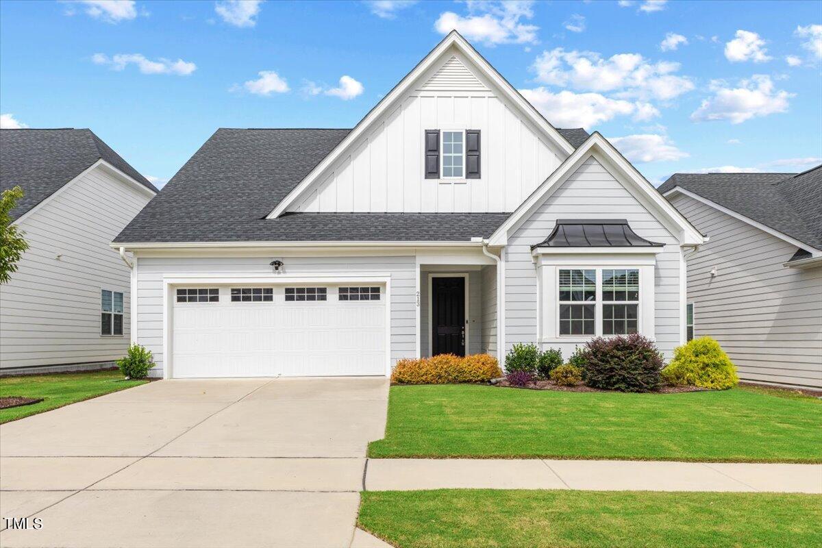 213 Mahogany Run Raleigh, NC 27610 - Photo 2 of 40 a view of a house with a yard