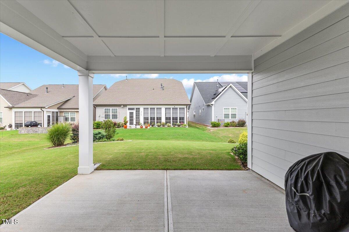 213 Mahogany Run Raleigh, NC 27610 - Photo 29 of 40 a view of a house with a garden