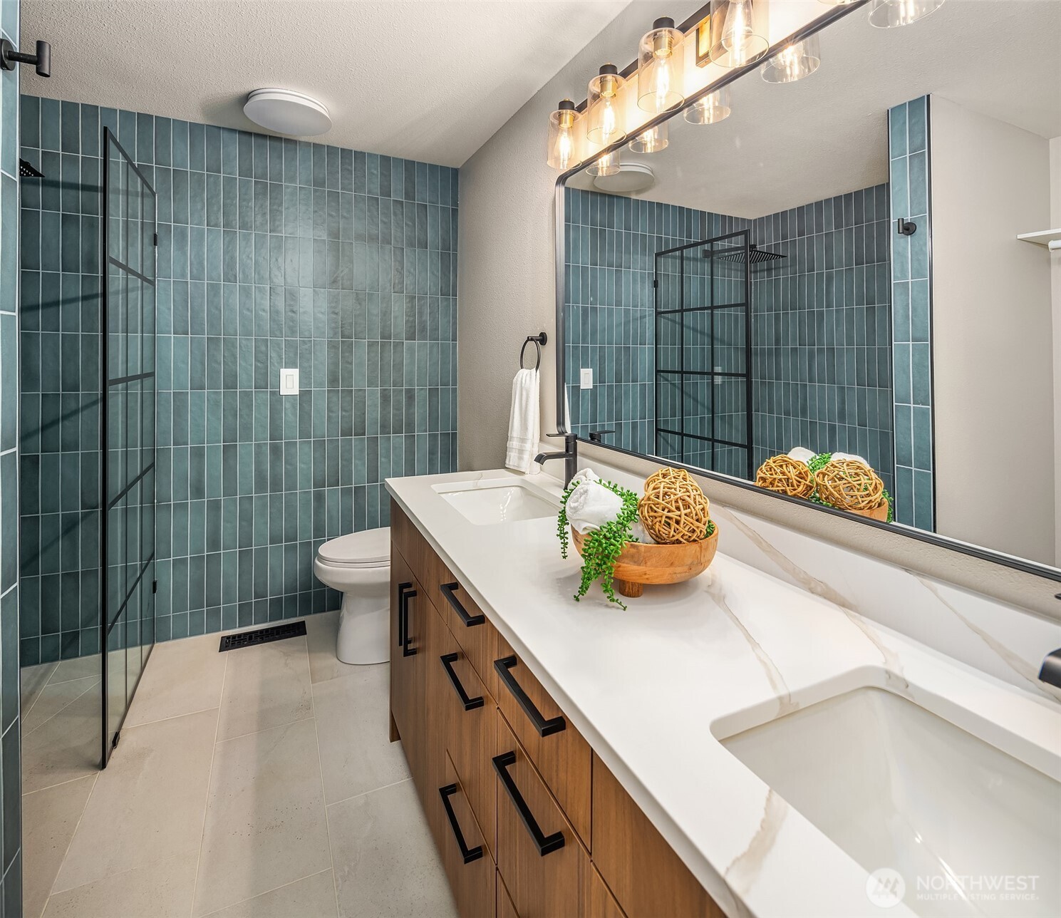 16914 28th Drive Southeast Bothell, WA 98012 - Photo 14 of 30 a bathroom with a sink a toilet and shower
