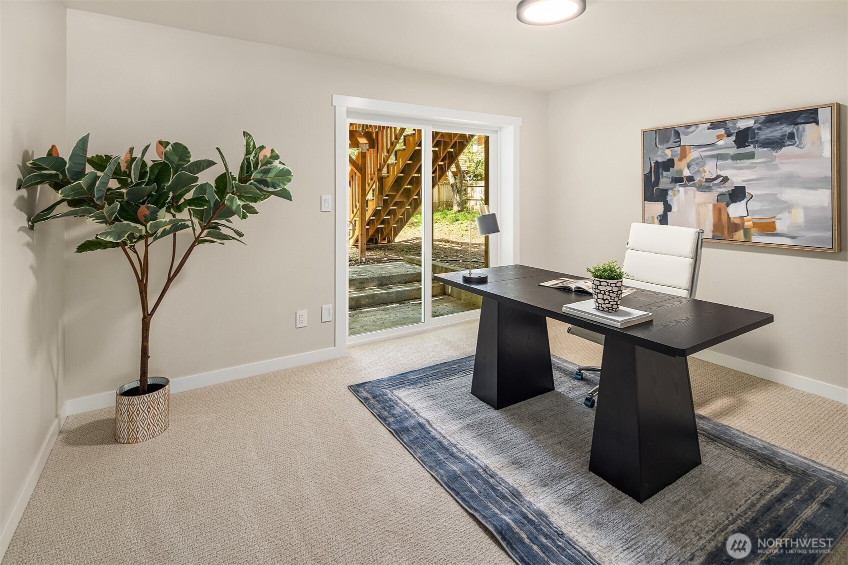 16914 28th Drive Southeast Bothell, WA 98012 - Photo 20 of 30 a living room with furniture and a potted plant