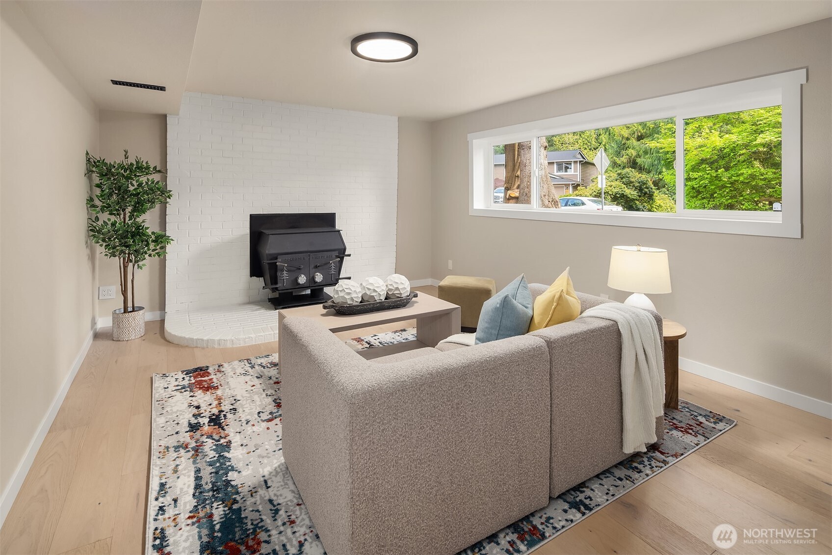 16914 28th Drive Southeast Bothell, WA 98012 - Photo 21 of 30 a living room with furniture and a flat screen tv