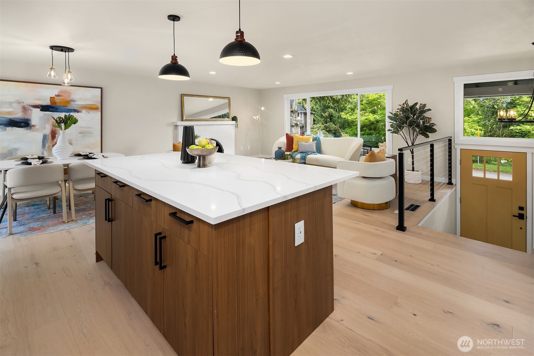 16914 28th Drive Southeast Bothell, WA 98012 - Photo 6 of 30 a view of kitchen island with stainless steel appliances wooden floor dining table and chairs