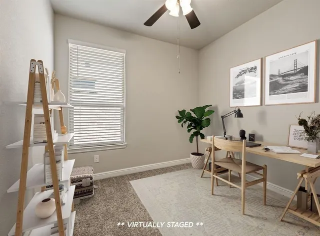 a dining room with furniture and window