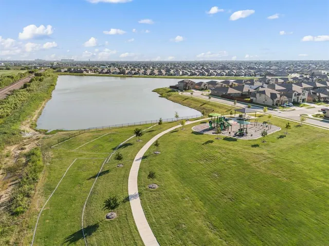 a view of a swimming pool with a lake