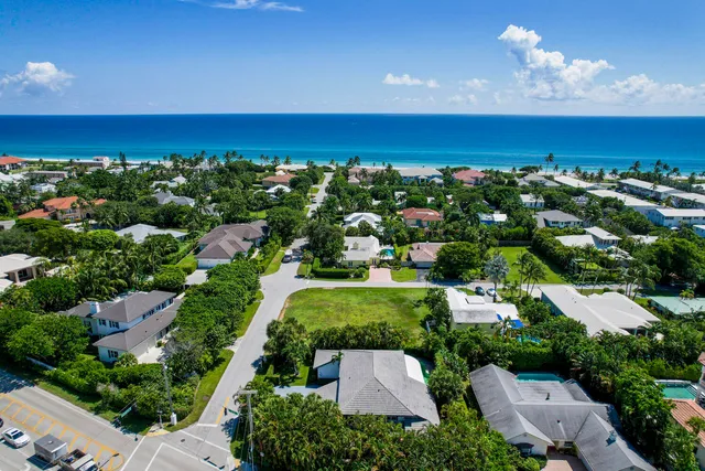 an aerial view of a house with a garden