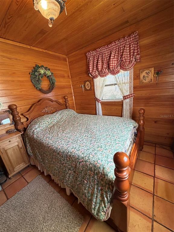 1106 Fox Hunter S Road Perry, FL 32348 - Photo 20 of 23 a bedroom with a bed and dresser