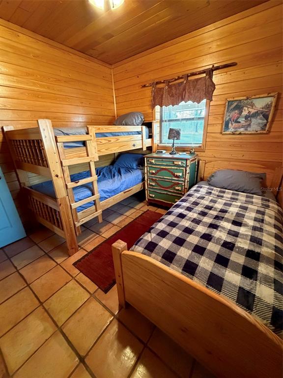 1106 Fox Hunter S Road Perry, FL 32348 - Photo 21 of 23 a bedroom with furniture and window