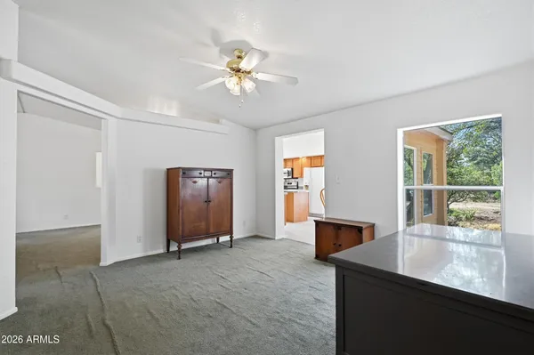 a view of livingroom with furniture wooden floor and window