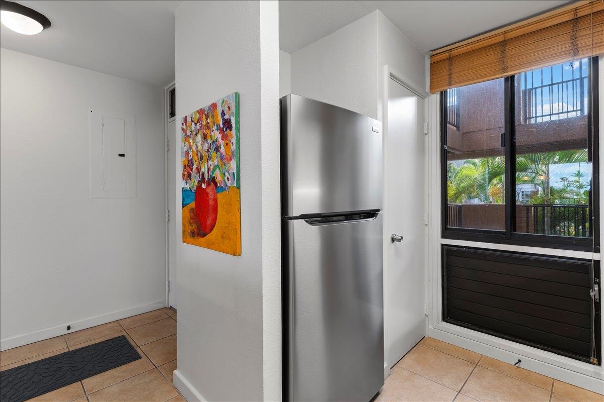 2695 South Kihei Road, Unit 5205 Kihei, HI 96753 - Photo 12 of 43 a view of hallway with furniture and a refrigerator