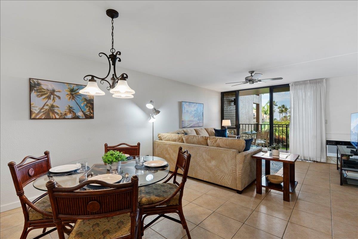 2695 South Kihei Road, Unit 5205 Kihei, HI 96753 - Photo 20 of 43 a living room with furniture and a large window