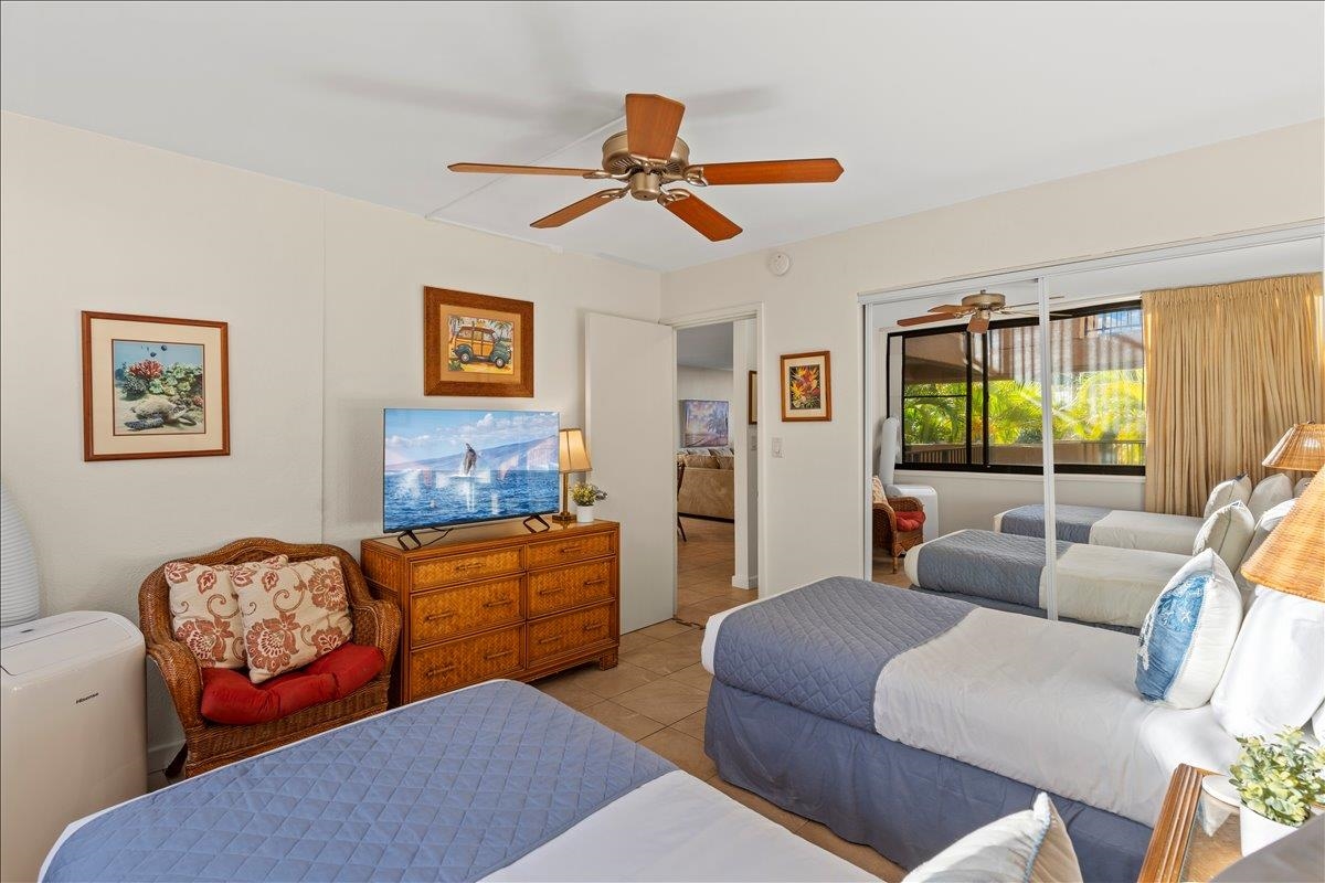 2695 South Kihei Road, Unit 5205 Kihei, HI 96753 - Photo 35 of 43 a living room with furniture and a large window