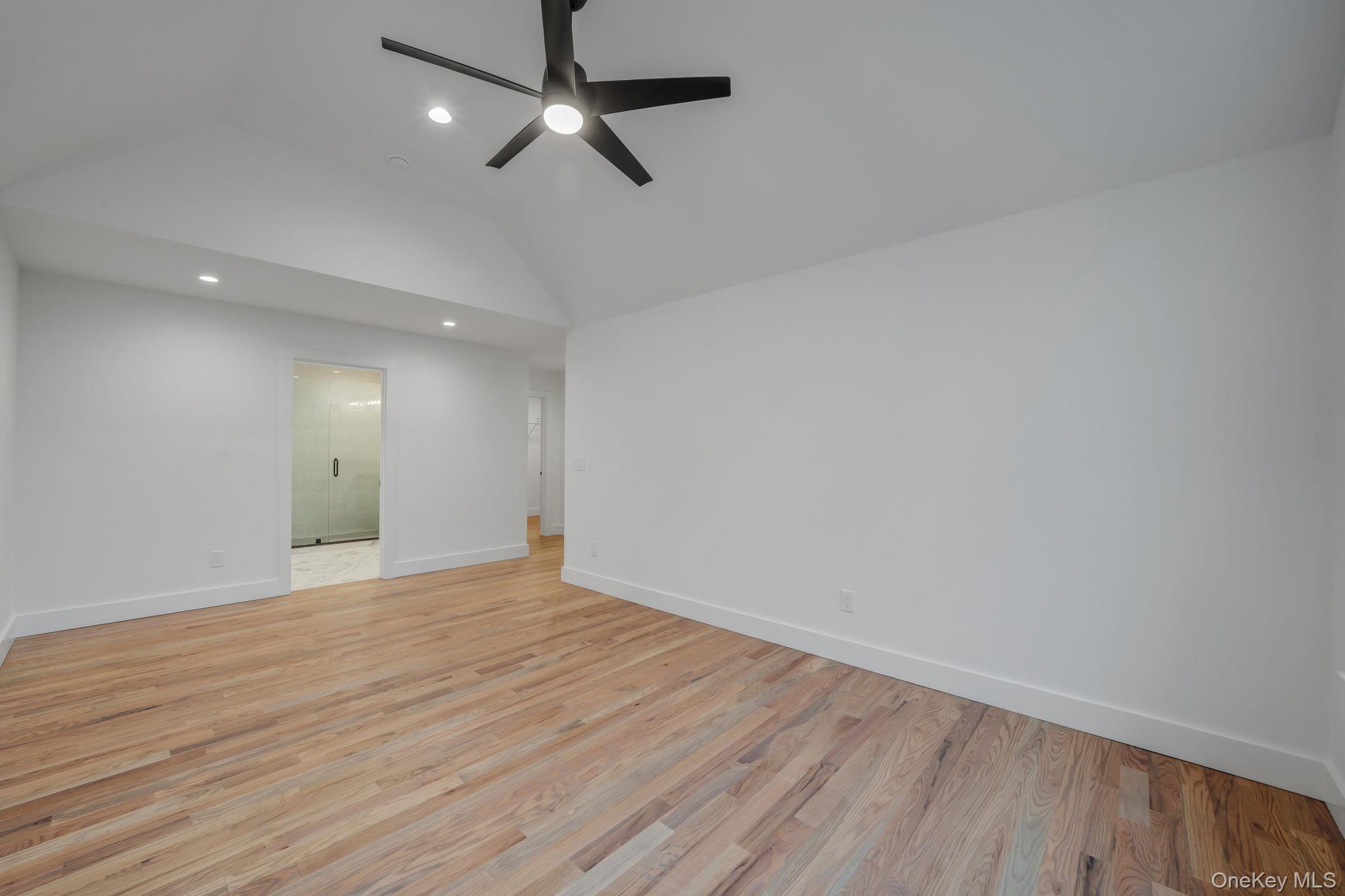 63 C Blydenburgh Road Centereach, NY 11720 - Photo 18 of 38 a view of an empty room with wooden floor