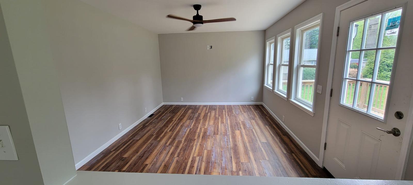 102 Rothwell Drive Wilmington, DE 19804 - Photo 11 of 19 TV Room with deck entrance - Bright and spacious