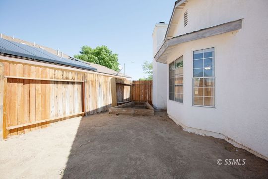 421 Christopher Court Ridgecrest, CA 93555 - Photo 41 of 50 a view of an house with backyard and parking