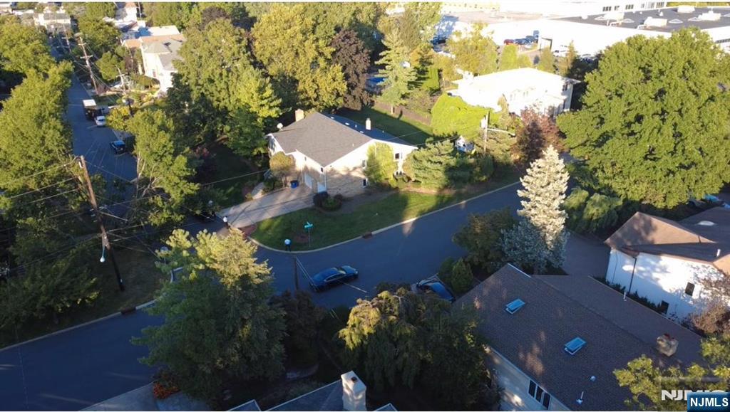 45 Center Street Englewood Cliffs, NJ 07632 - Photo 17 of 18 a view of a house with a yard and garden