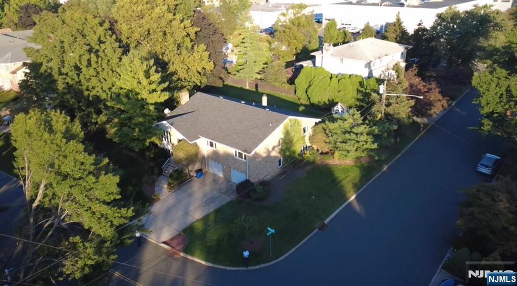 45 Center Street Englewood Cliffs, NJ 07632 - Photo 18 of 18 an aerial view of a house with a yard and large trees