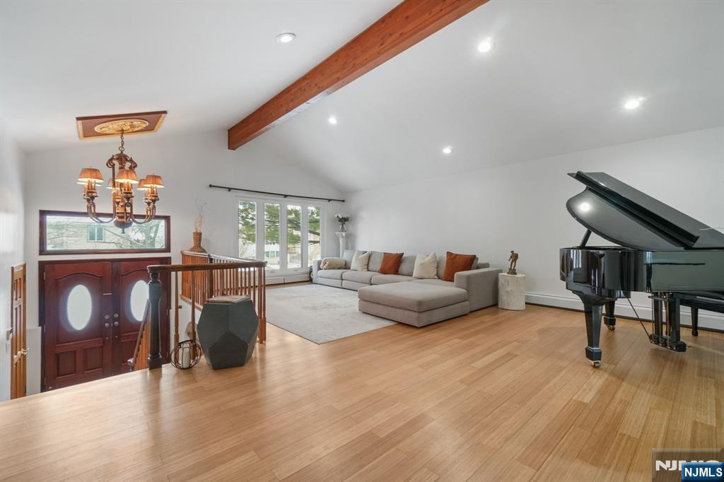 45 Center Street Englewood Cliffs, NJ 07632 - Photo 5 of 18 a living room with furniture and a wooden floor
