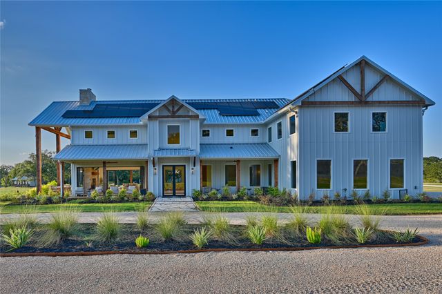 a view of a house with a big yard