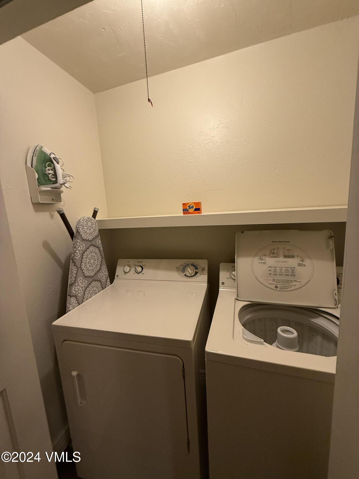 1020 Vail View Drive, Unit 220434 Vail, CO 81657 - Photo 10 of 21 a utility room with dryer and washer