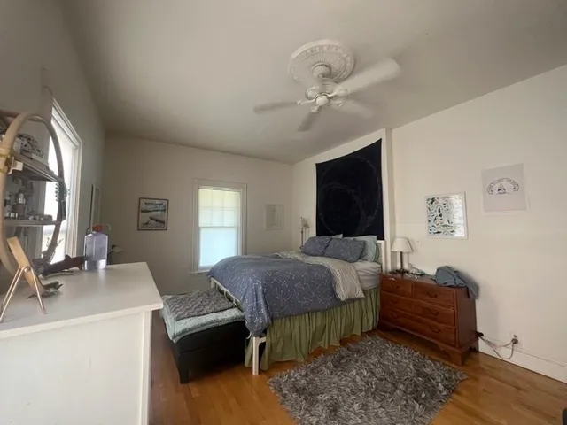 a bathroom with a sink and a shower curtain