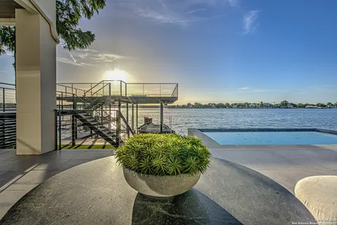 a view of a swimming pool with a chairs