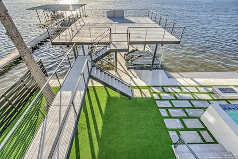 a view of swimming pool with a patio