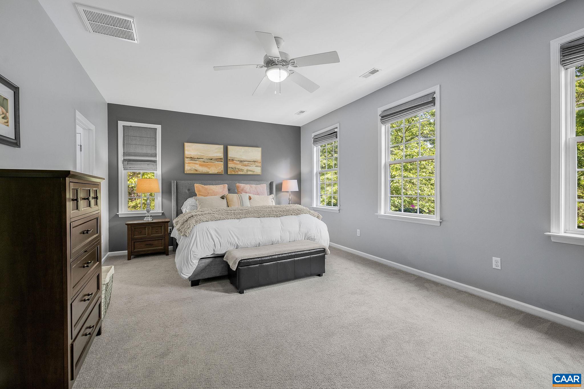 3591 Garth Road Charlottesville, VA 22901 - Photo 29 of 61 a spacious bedroom with a bed dresser and a window