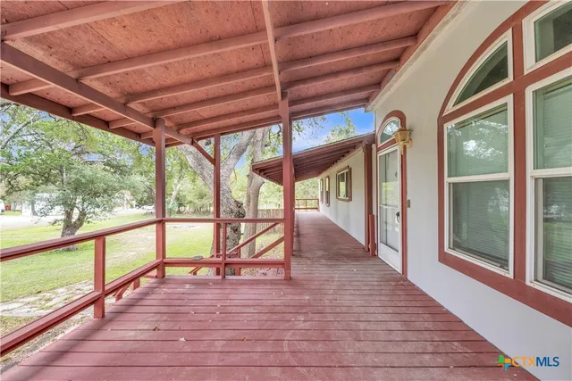 a view of a chairs on the deck