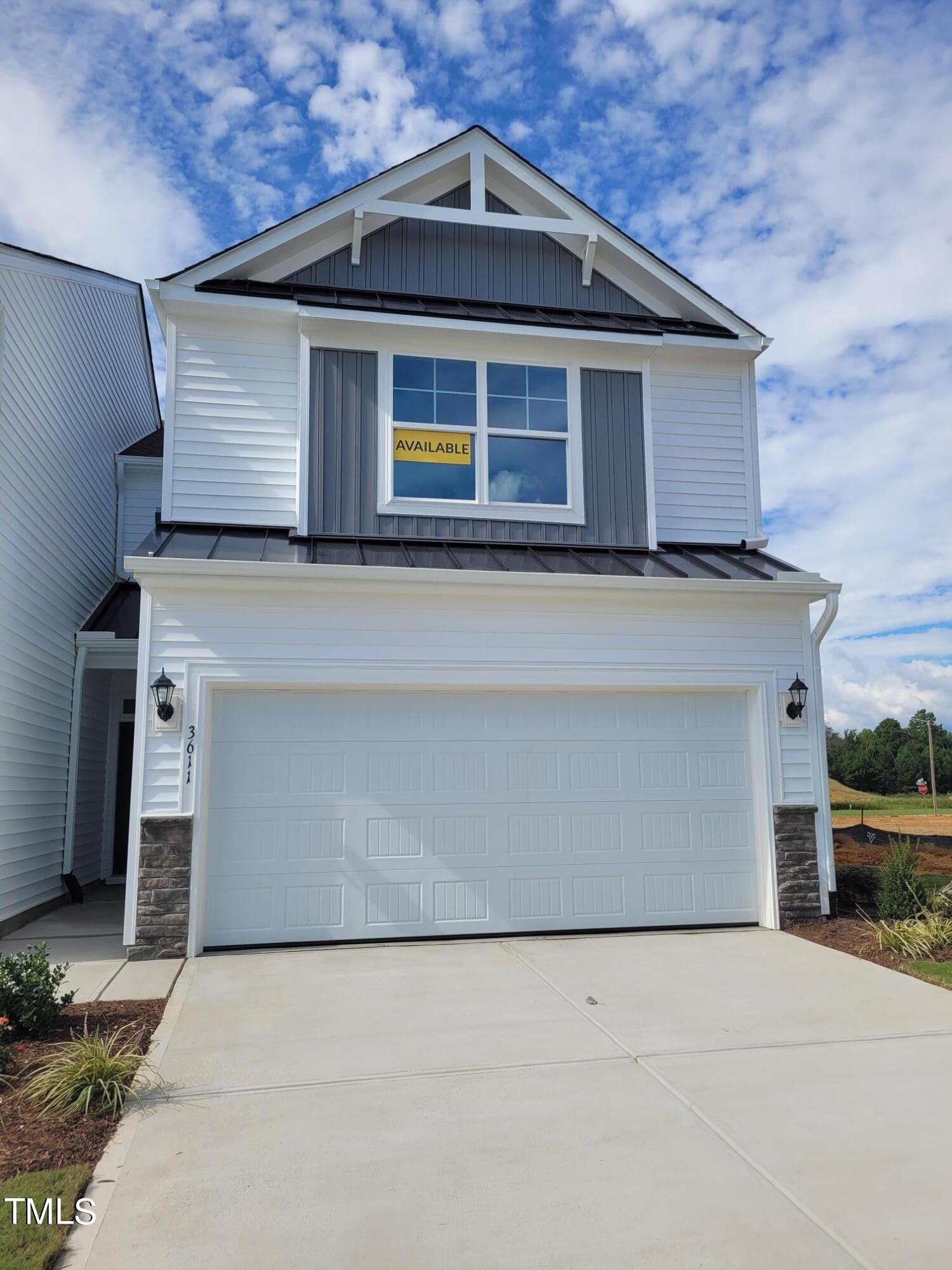 3611 Tarmac Road West Wilson, NC 27896 - Photo 1 of 28 a front view of a house with a garage