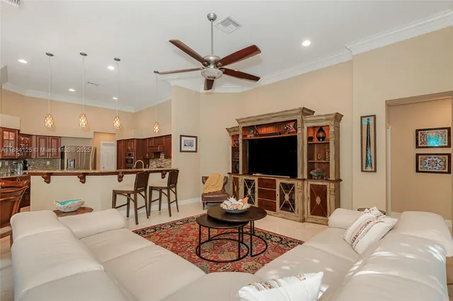a view white cabinets and sink