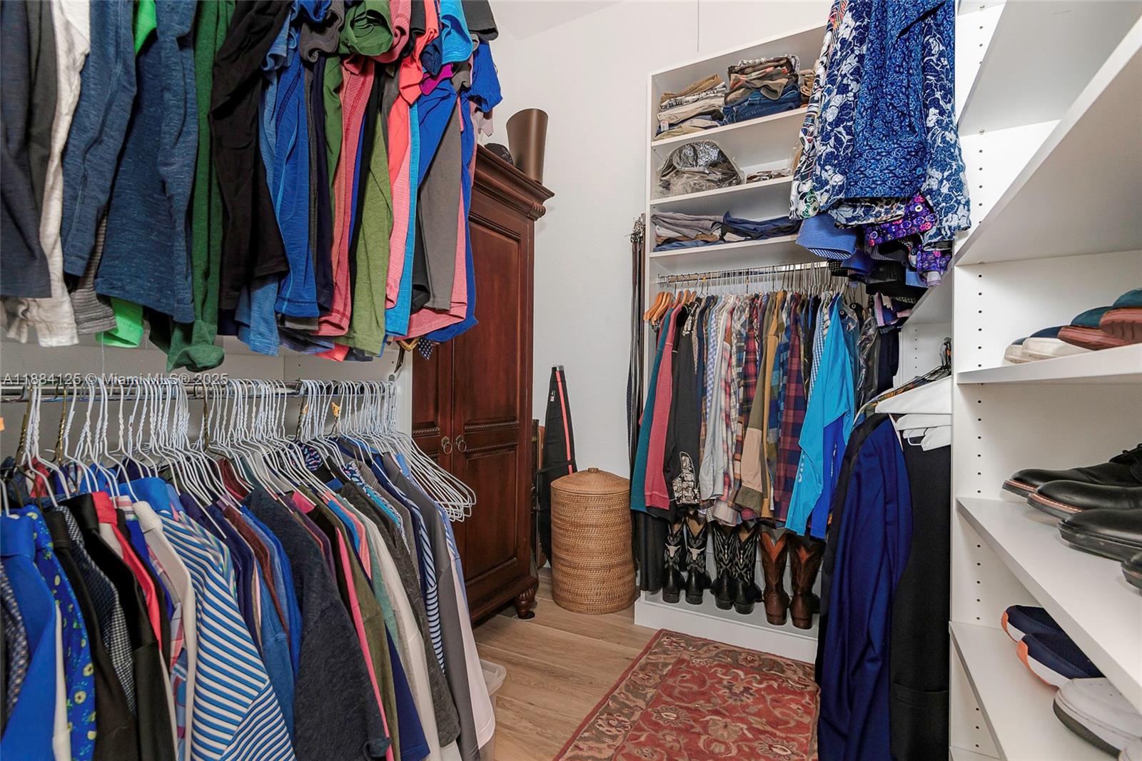 1100 Southwest 156th Avenue Pembroke Pines, FL 33027 - Photo 46 of 86 a view of walk in closet with clothes and shoes