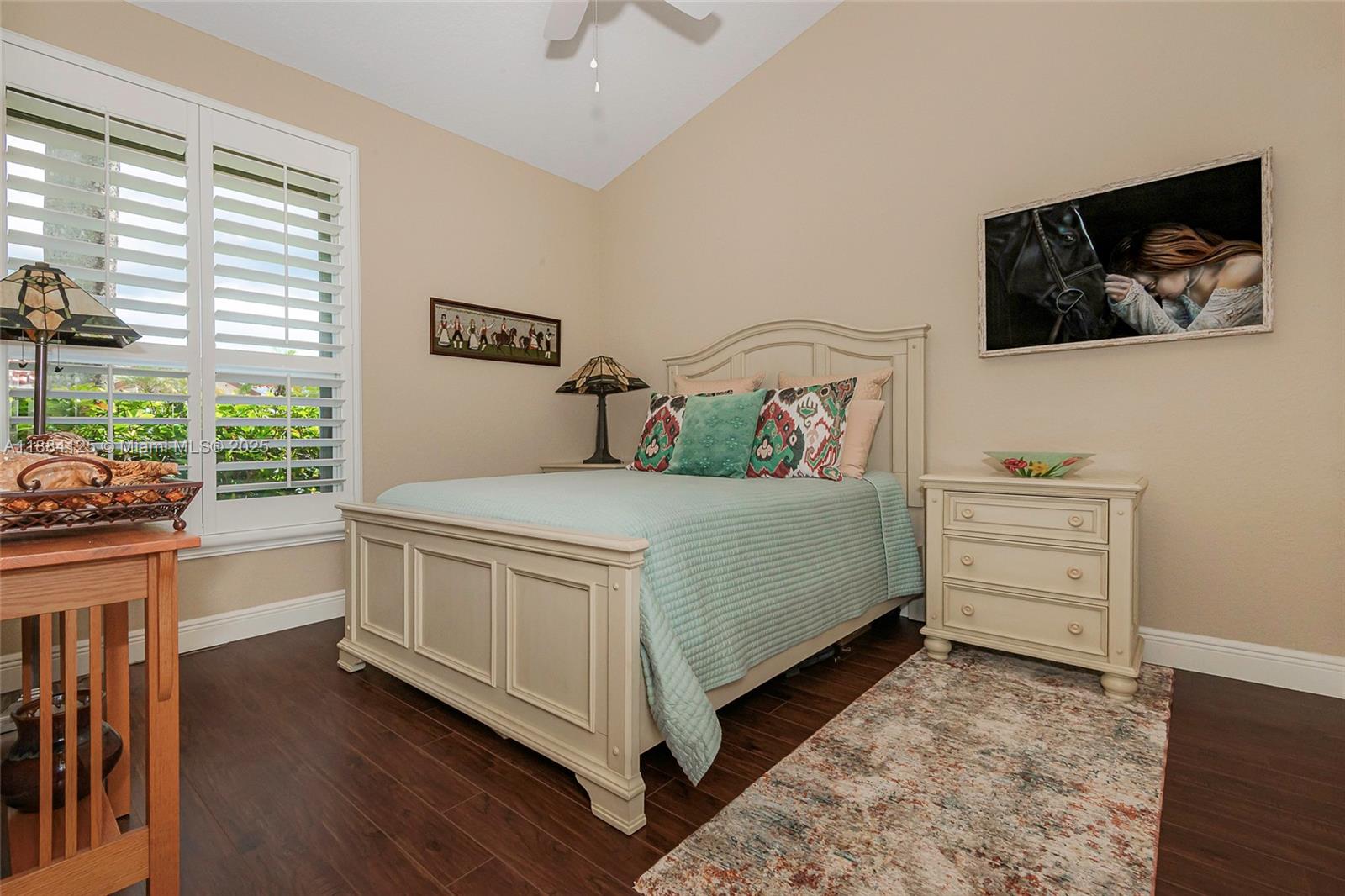 1100 Southwest 156th Avenue Pembroke Pines, FL 33027 - Photo 59 of 86 a bedroom with a bed and a window
