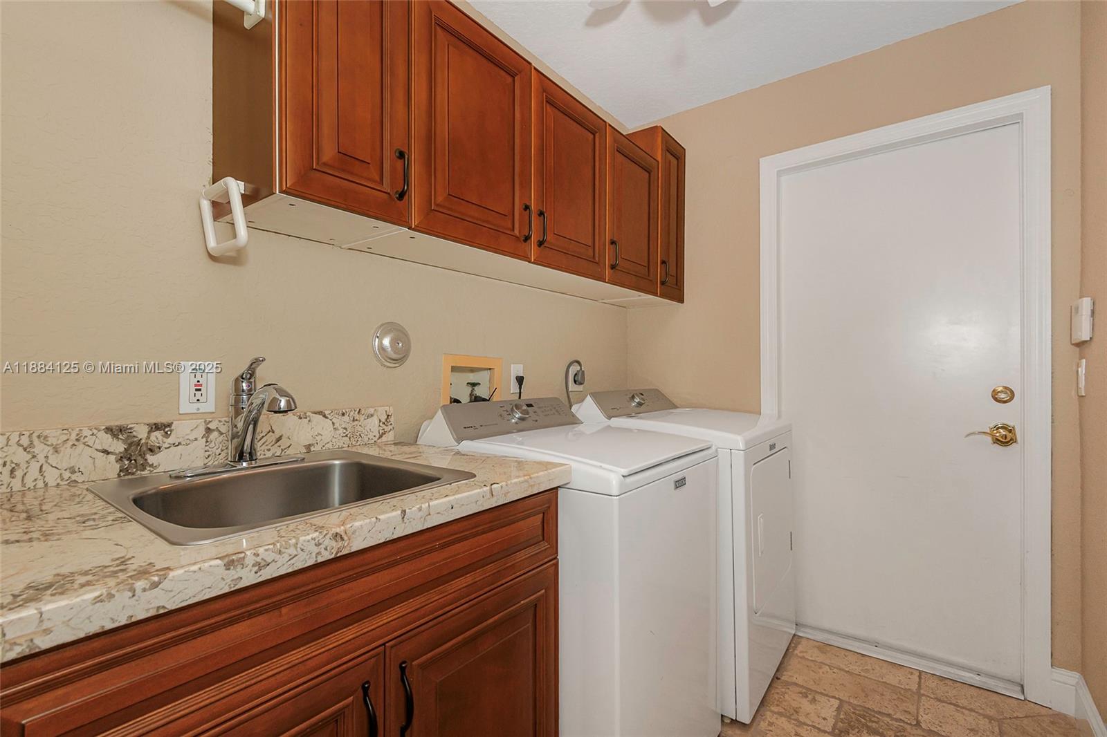 1100 Southwest 156th Avenue Pembroke Pines, FL 33027 - Photo 66 of 86 a view white cabinets and sink