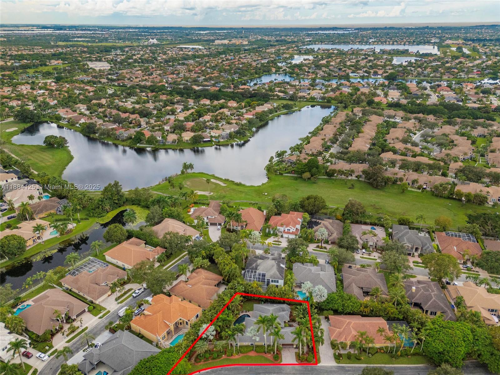 1100 Southwest 156th Avenue Pembroke Pines, FL 33027 - Photo 84 of 86 an aerial view of residential houses with outdoor space