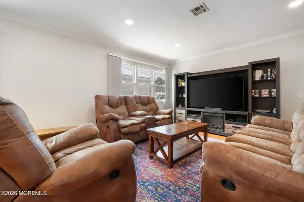 a kitchen with granite countertop cabinets and steel stainless steel appliances