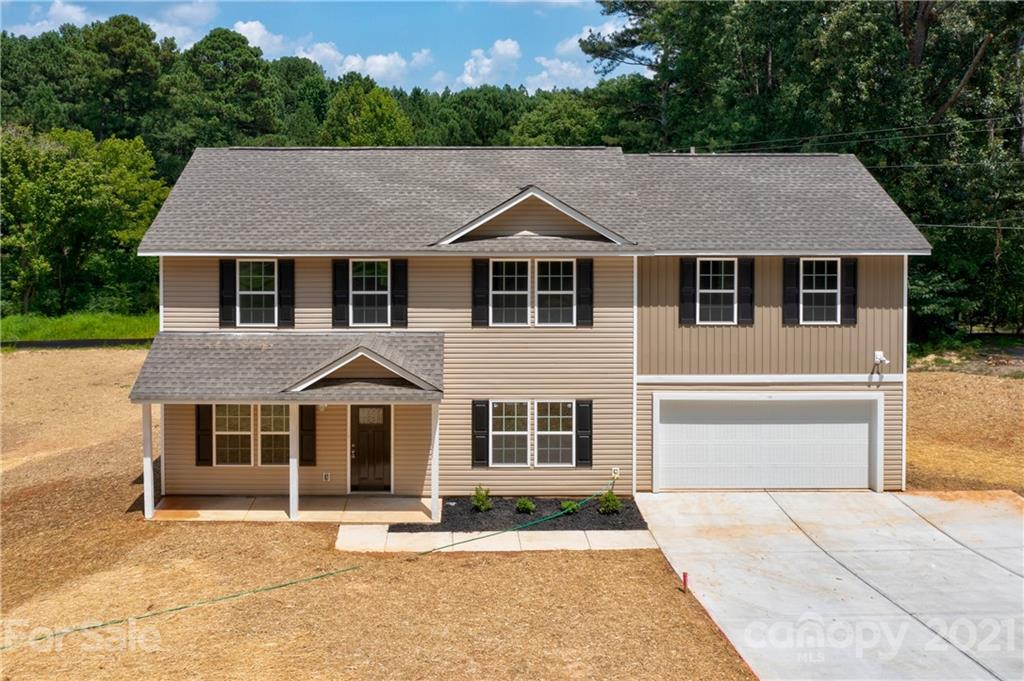 1720 Love Road Monroe, NC 28110 - Photo 1 of 48 a aerial view of a house with a yard