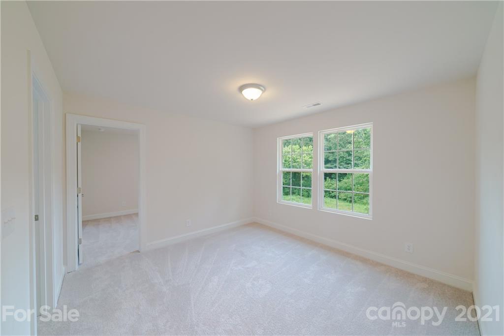 1720 Love Road Monroe, NC 28110 - Photo 22 of 48 an empty room with a window