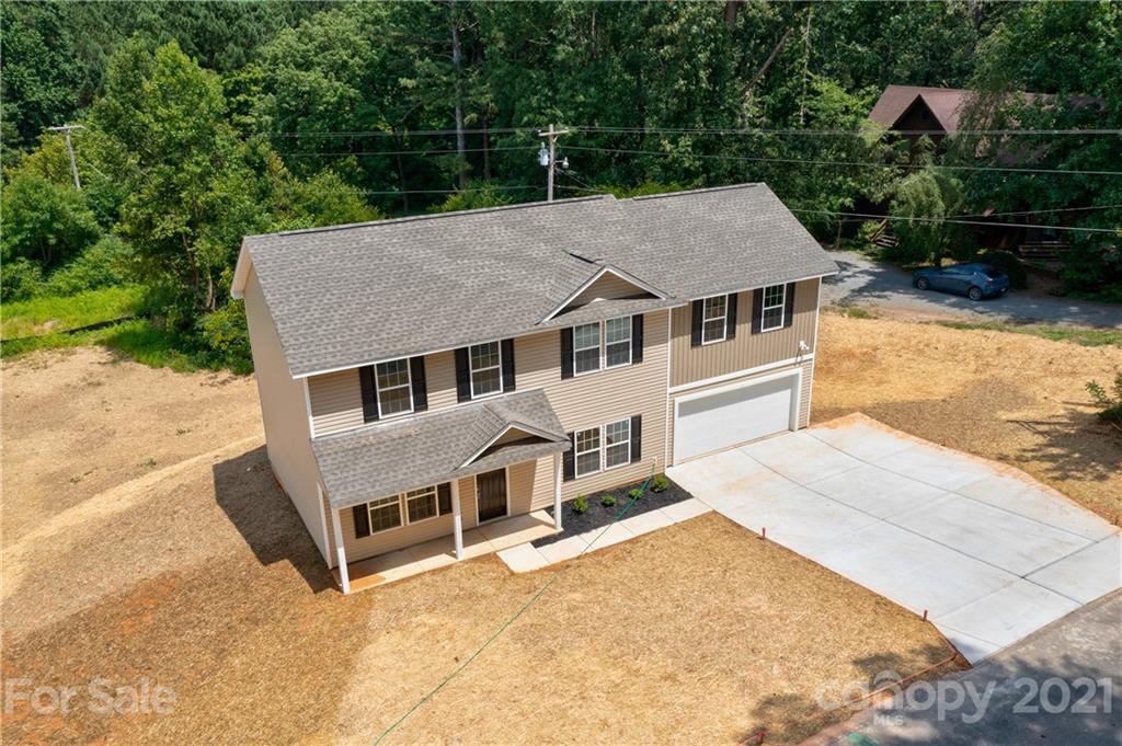 1720 Love Road Monroe, NC 28110 - Photo 4 of 48 an aerial view of a house with yard porch and furniture