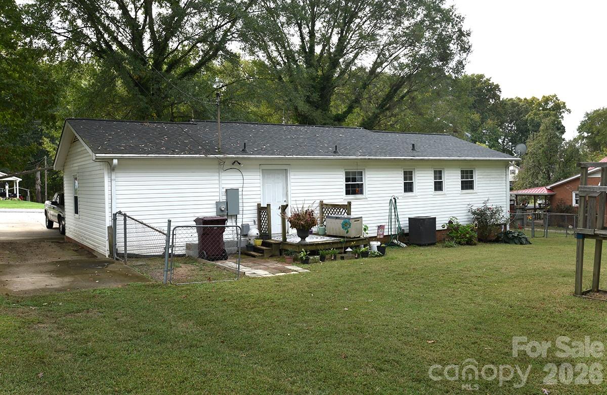 130 Happy Hollow Road, Unit 13/B Rockwell, NC 28138 - Photo 2 of 17 a view of a house with backyard and sitting area