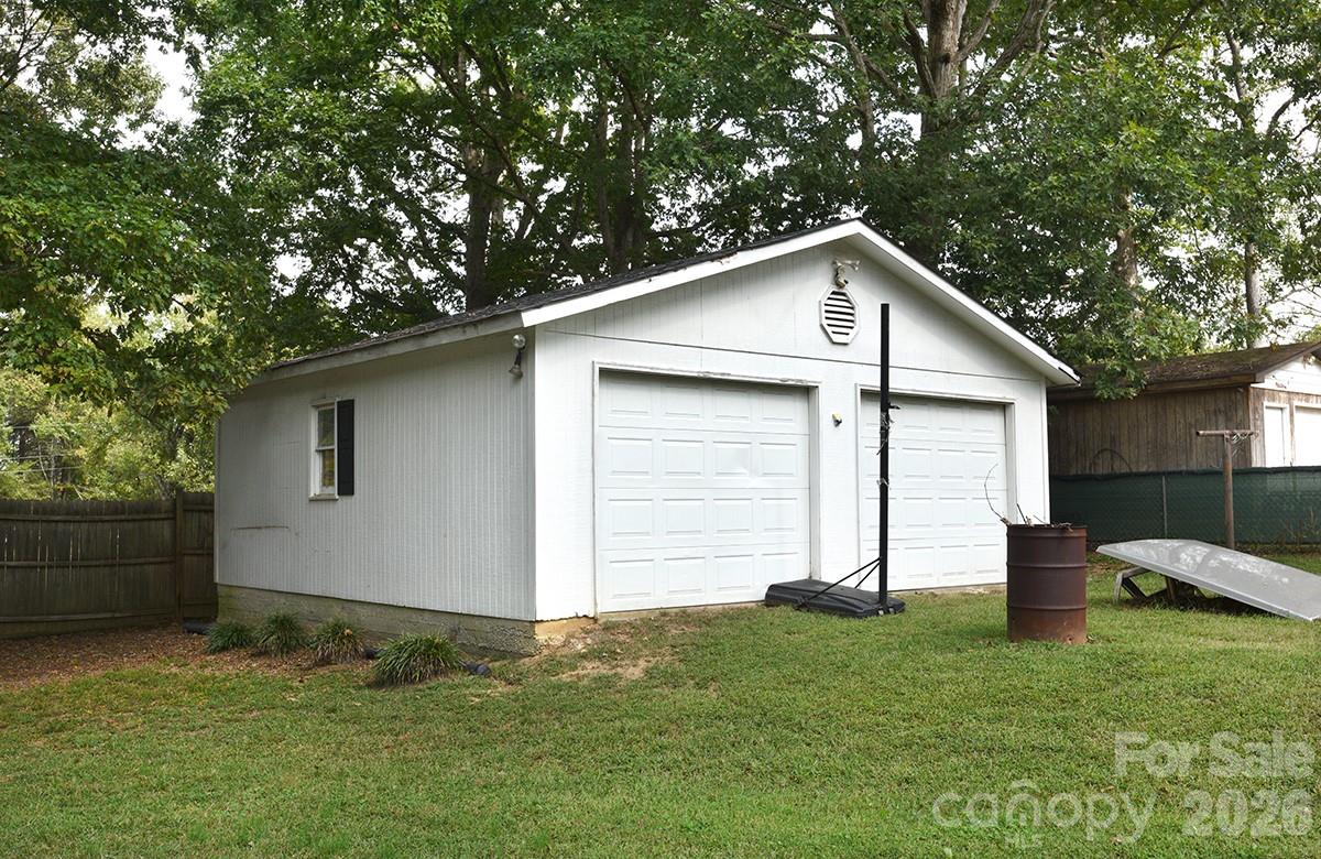 130 Happy Hollow Road, Unit 13/B Rockwell, NC 28138 - Photo 4 of 17 a backyard of a house with lots of green space