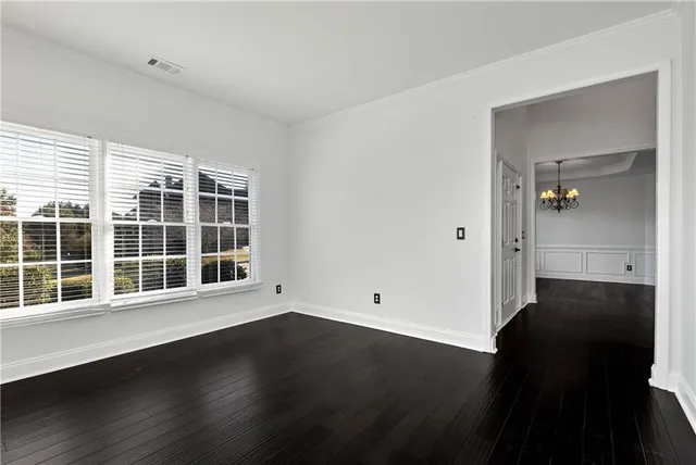 a view of a fireplace with wooden floor