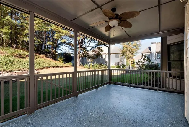 a bath tub sitting next to a window
