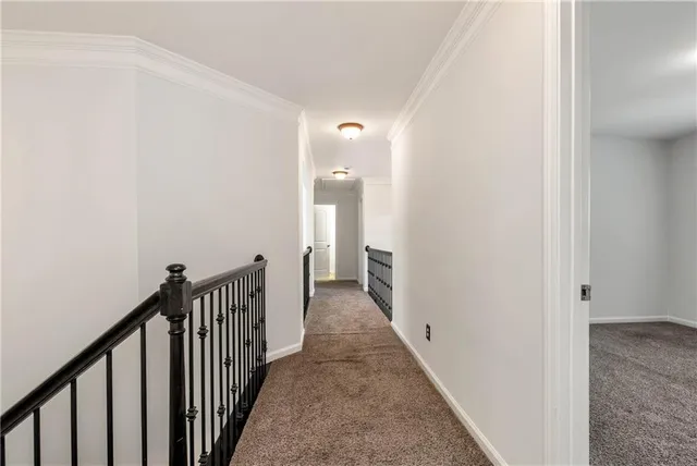 a bathroom with a granite countertop sink double and a mirror