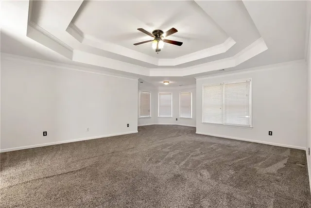 a bathroom with a shower and toilet