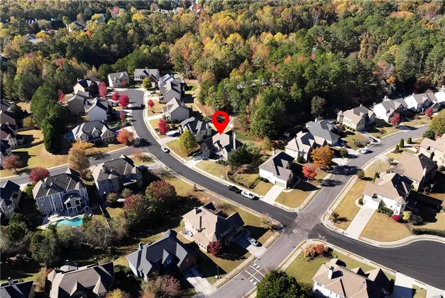 a view of a house with a yard balcony