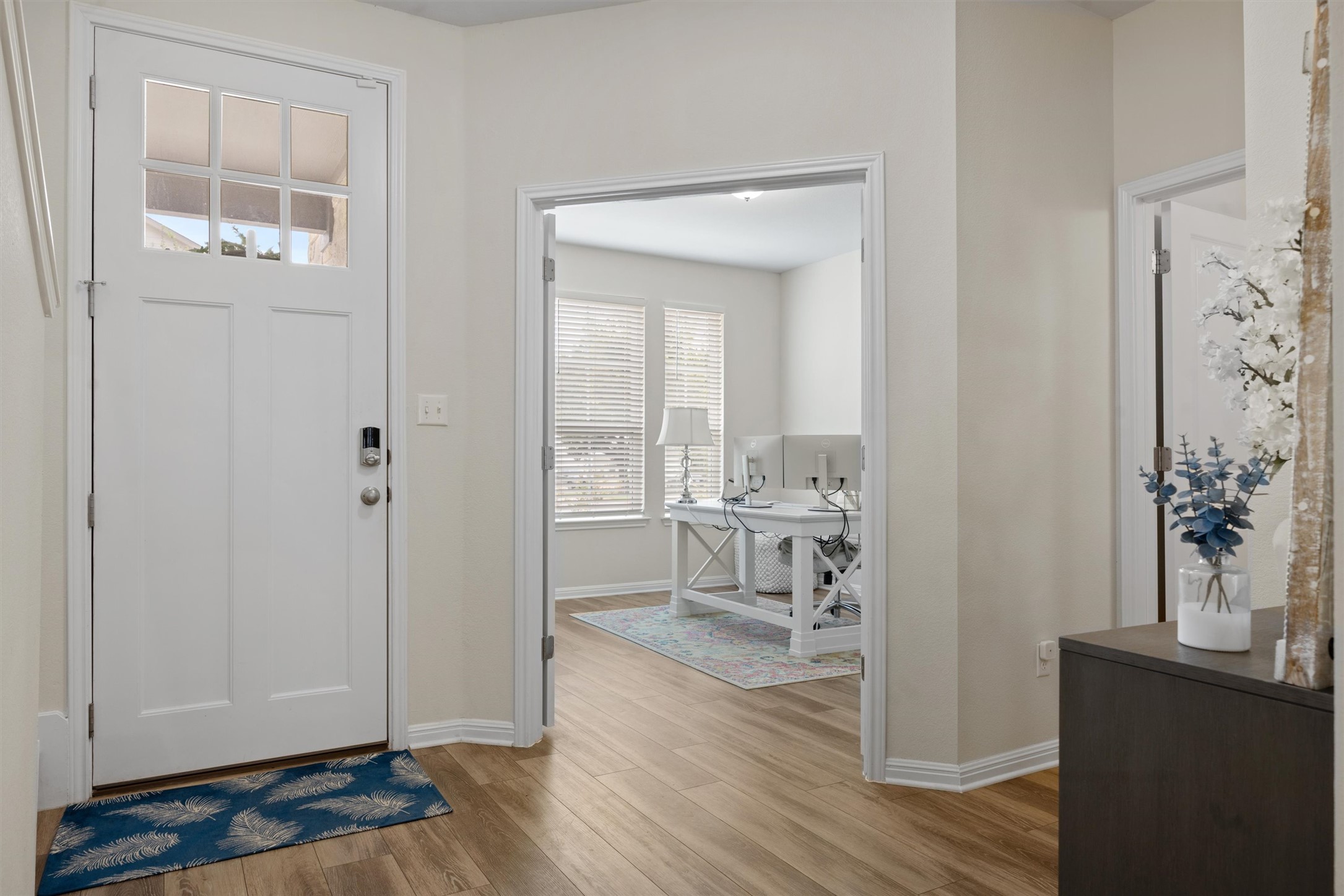313 Toddy Way Leander, TX 78641 - Photo 5 of 39 Foyer with baseboards and light wood-style floors