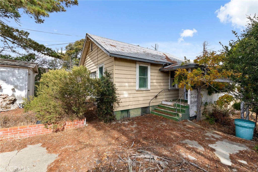 2645 Adobe Road Morro Bay, CA 93442 - Photo 5 of 28 a view of house with a yard