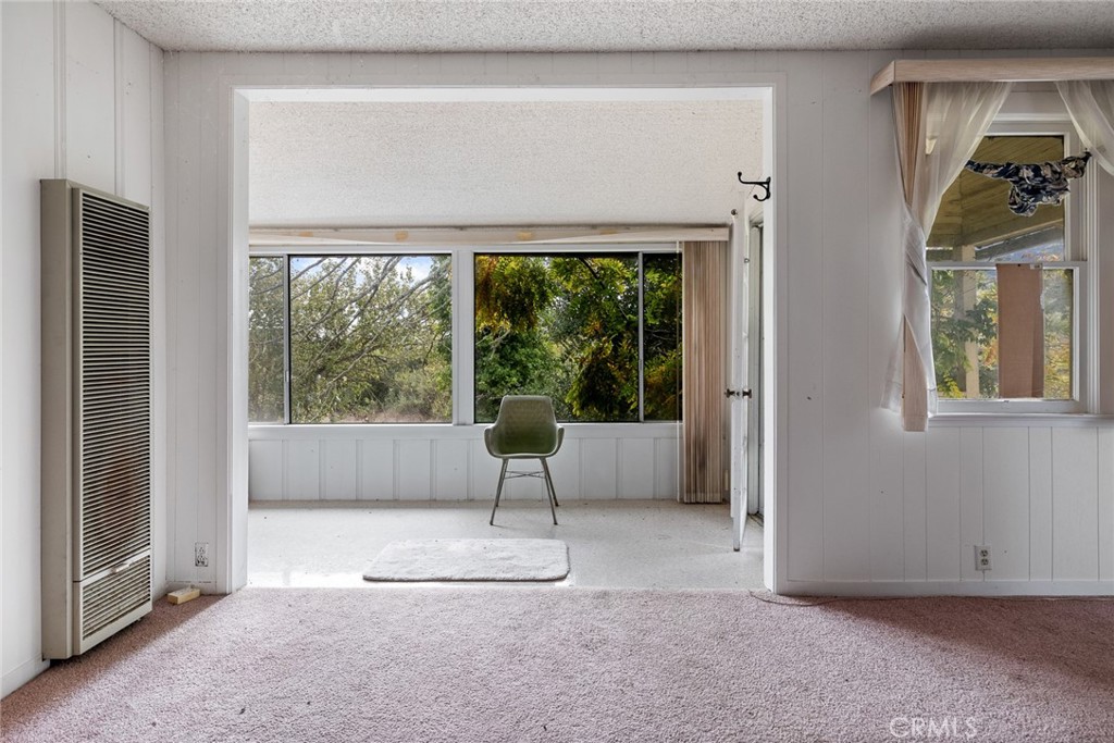 2645 Adobe Road Morro Bay, CA 93442 - Photo 9 of 28 a living room with furniture and a window