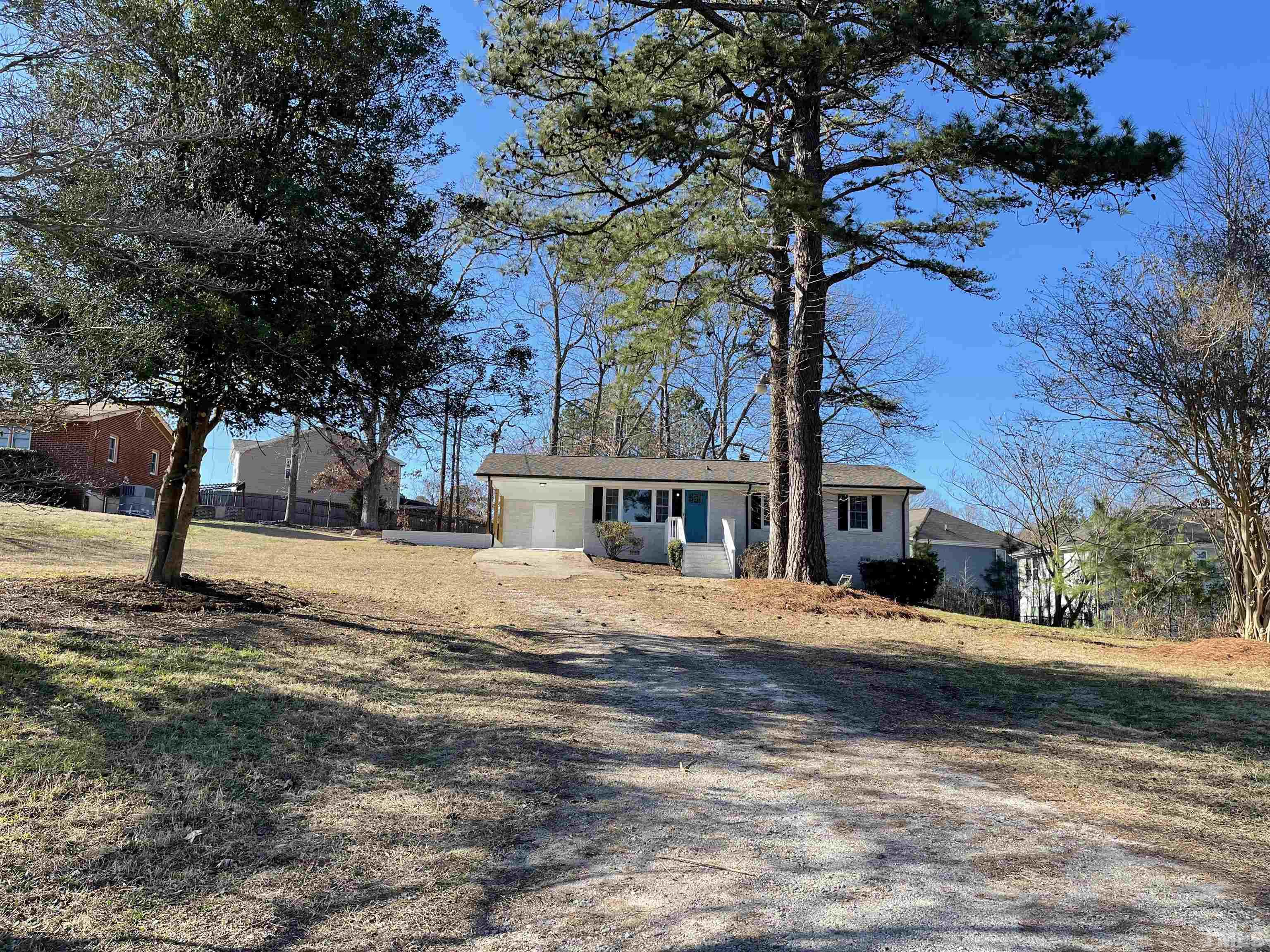 5425 Louisburg Road Raleigh, NC 27616 - Photo 1 of 15 a front view of a house with a yard