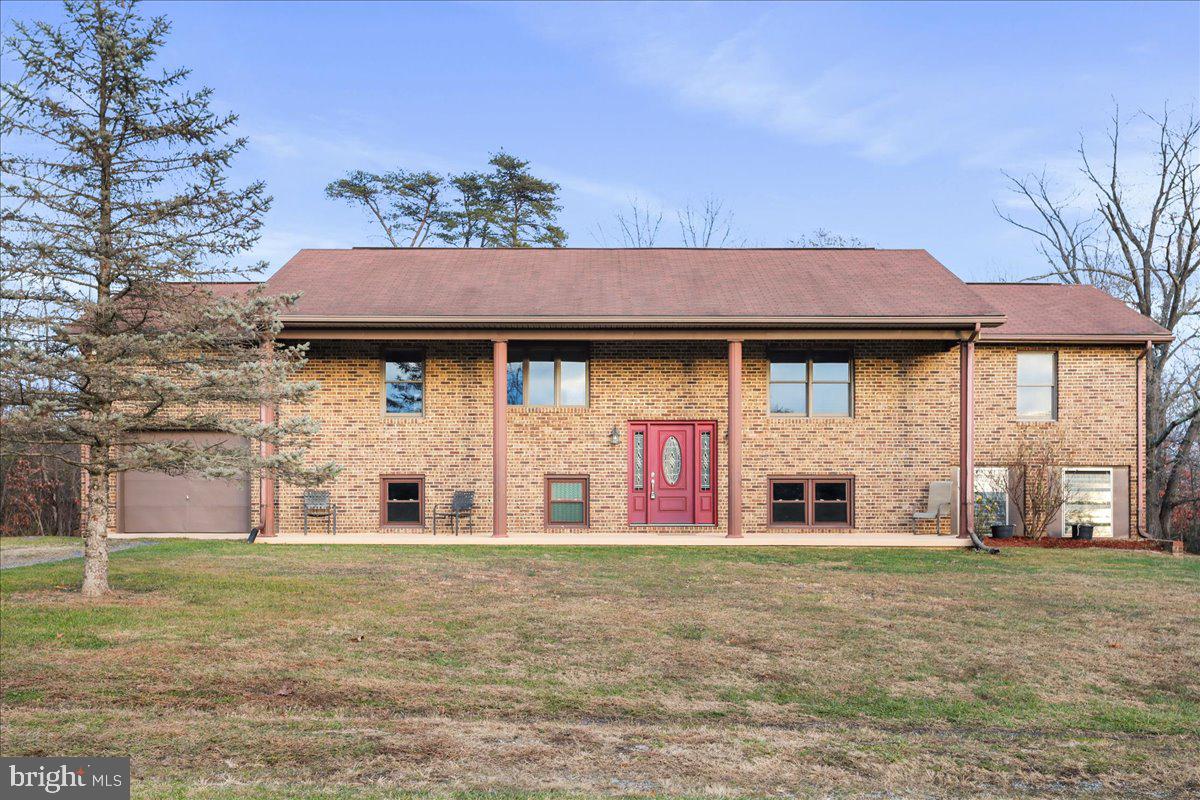 a house view with a garden space
